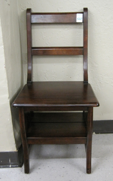 Appraisal: METAMORPHIC MAHOGANY LIBRARY CHAIR STEPS th h century having a