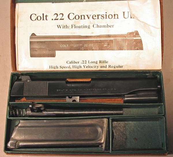 Appraisal: A boxed Colt post-war conversion kit Not serialized blued finish