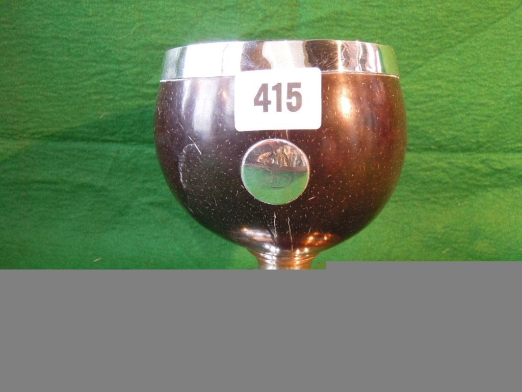 Appraisal: A silver metal mounted coconut cup with silver metal lining