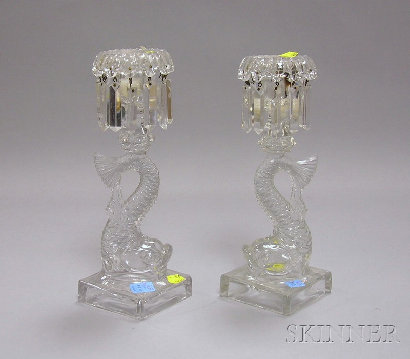 Appraisal: Pair of Sandwich Colorless Molded Glass Dolphin Figural Candlesticks ht