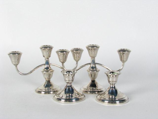 Appraisal: Two Pair of Sterling Silver Weighted Candlesticks one pair is