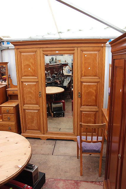 Appraisal: JOHN TAYLOR AND SON EDINBURGH SATINWOOD TRIPLE WARDROBE with central