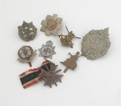 Appraisal: A collection of military and Regimental badges most seemingly World