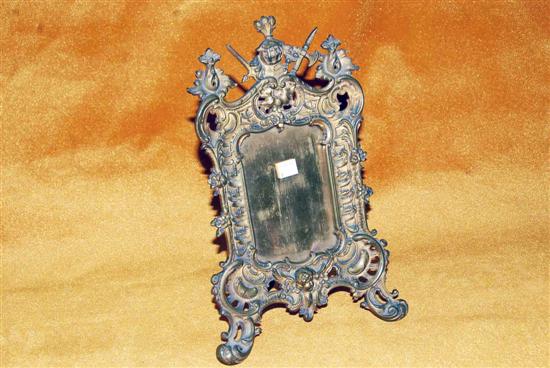 Appraisal: LATE TH C ROCOCO BRONZE FRAME With heraldic crest and