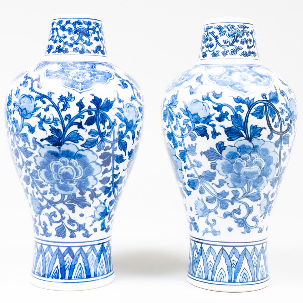 Appraisal: Pair of Asian Blue and White Vases Apocryphal blue six