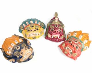 Appraisal: Four Painted Asian Masks Four painted Asian masks H x