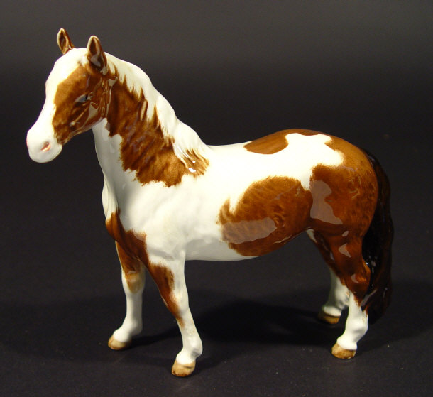 Appraisal: Beswick horse with hand painted brown and white decoration printed