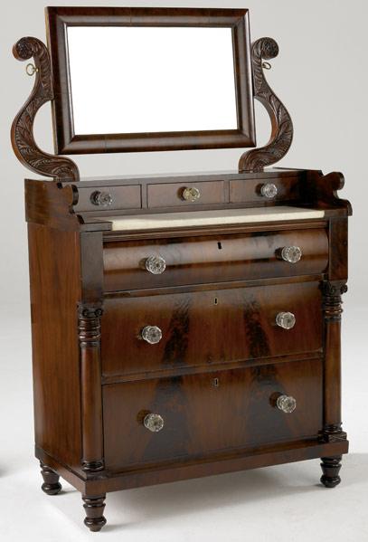 Appraisal: EMPIRE MIRRORED DRESSER In mahogany with marble insert glass pulls