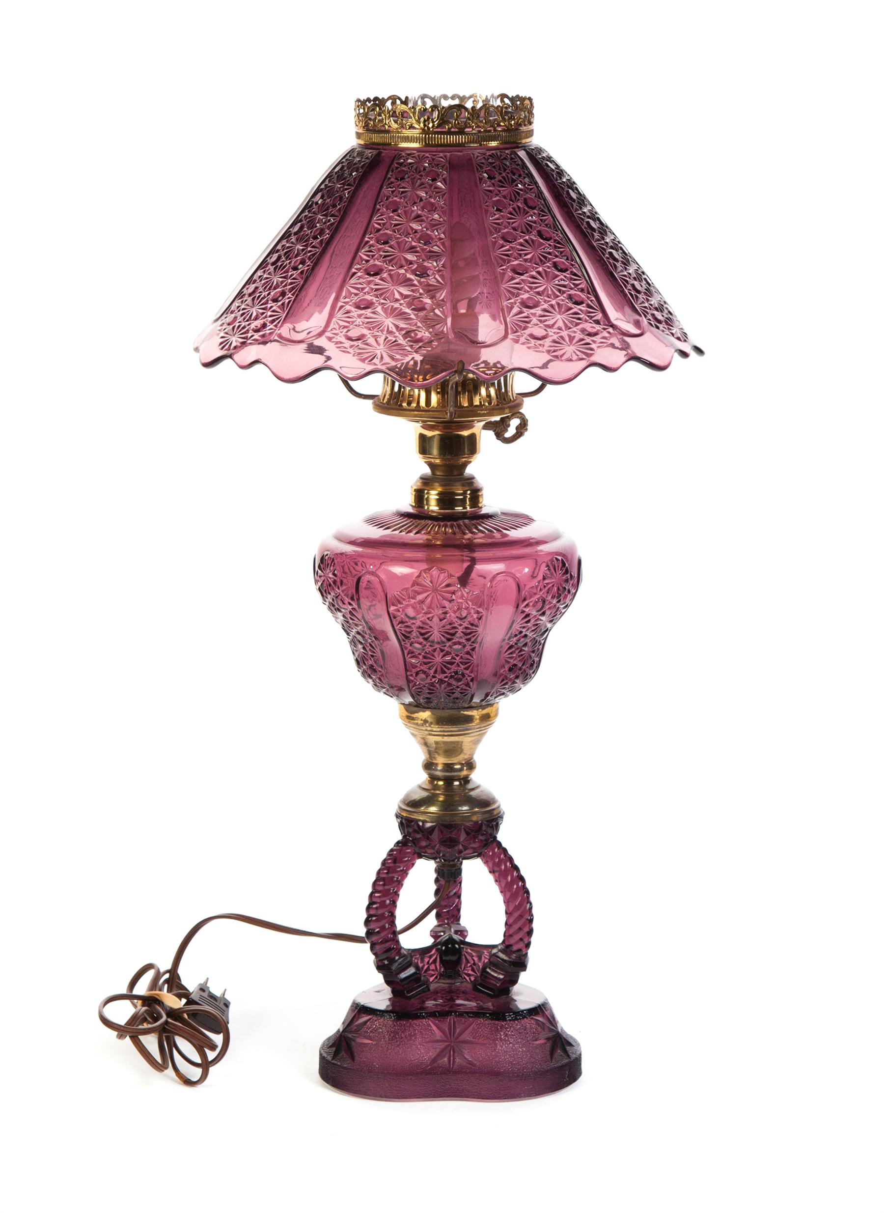 Appraisal: TABLE LAMP American th century Purple glass shade and body