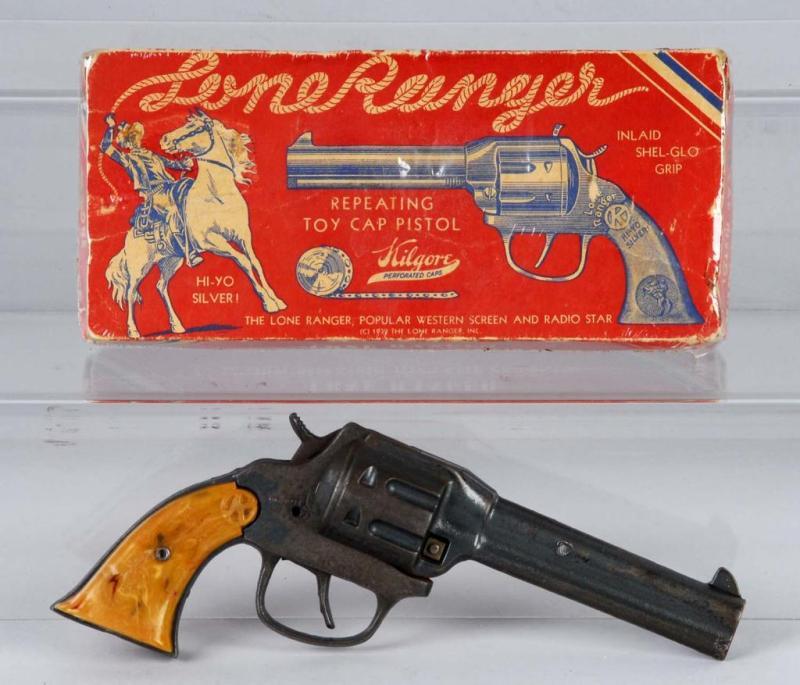 Appraisal: Cast Iron Lone Ranger Cap Gun Description One grip has