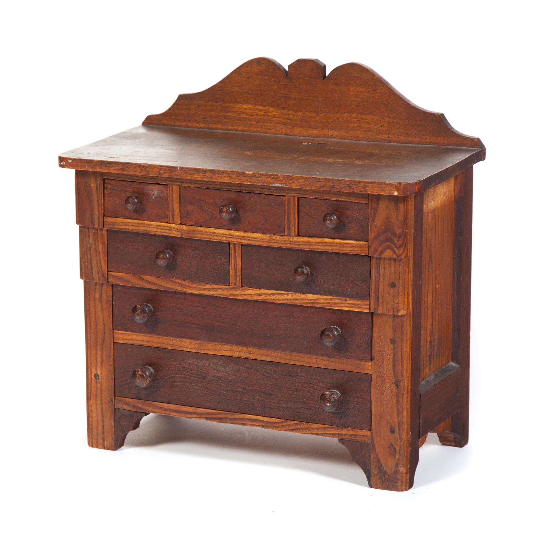 Appraisal: MINIATURE EMPIRE CHEST OF DRAWERS Ash and walnut with pine