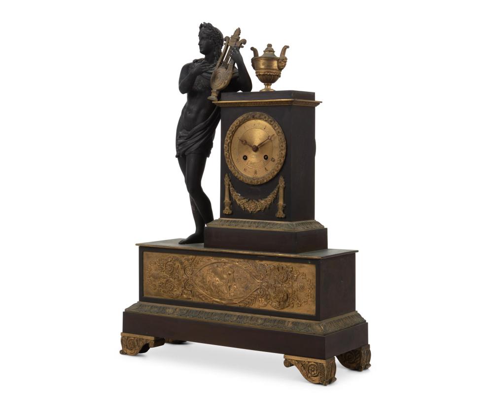 Appraisal: A FRENCH EMPIRE-STYLE MANTEL CLOCKA French Empire-style mantel clock Circa