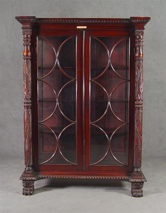 Appraisal: Mahogany Bookcase Early th Century Two glazed astragal doors flanked