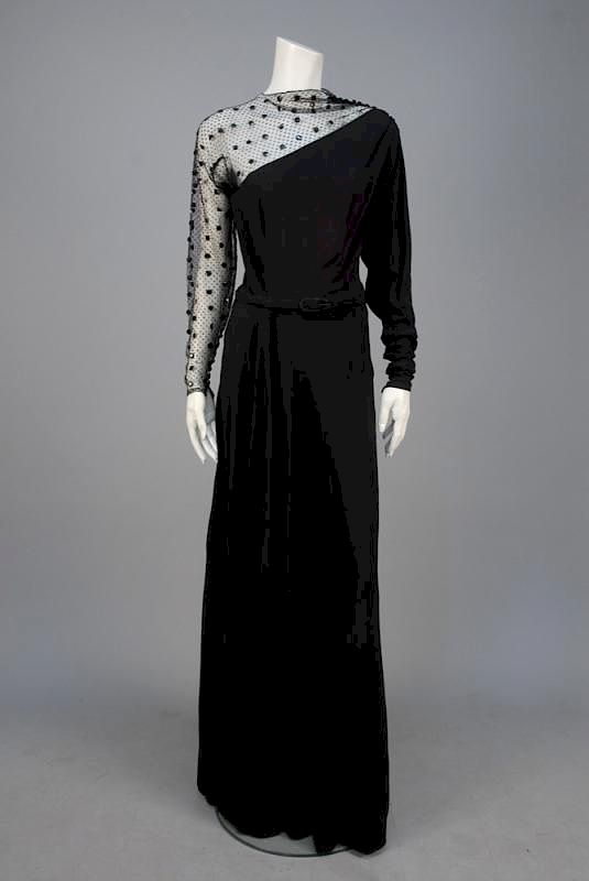 Appraisal: NETTIE ROSENSTEIN ASYMMETRICAL GOWN with SEQUINED NET c Long sleeve