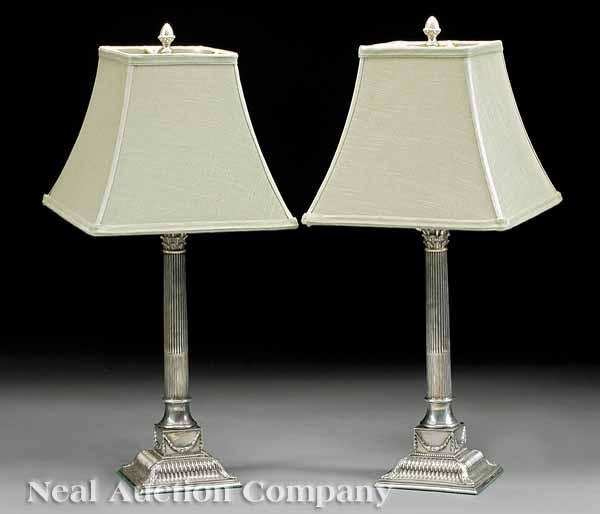 Appraisal: A Pair of Antique English Silverplate Candlesticks of Corinthian column