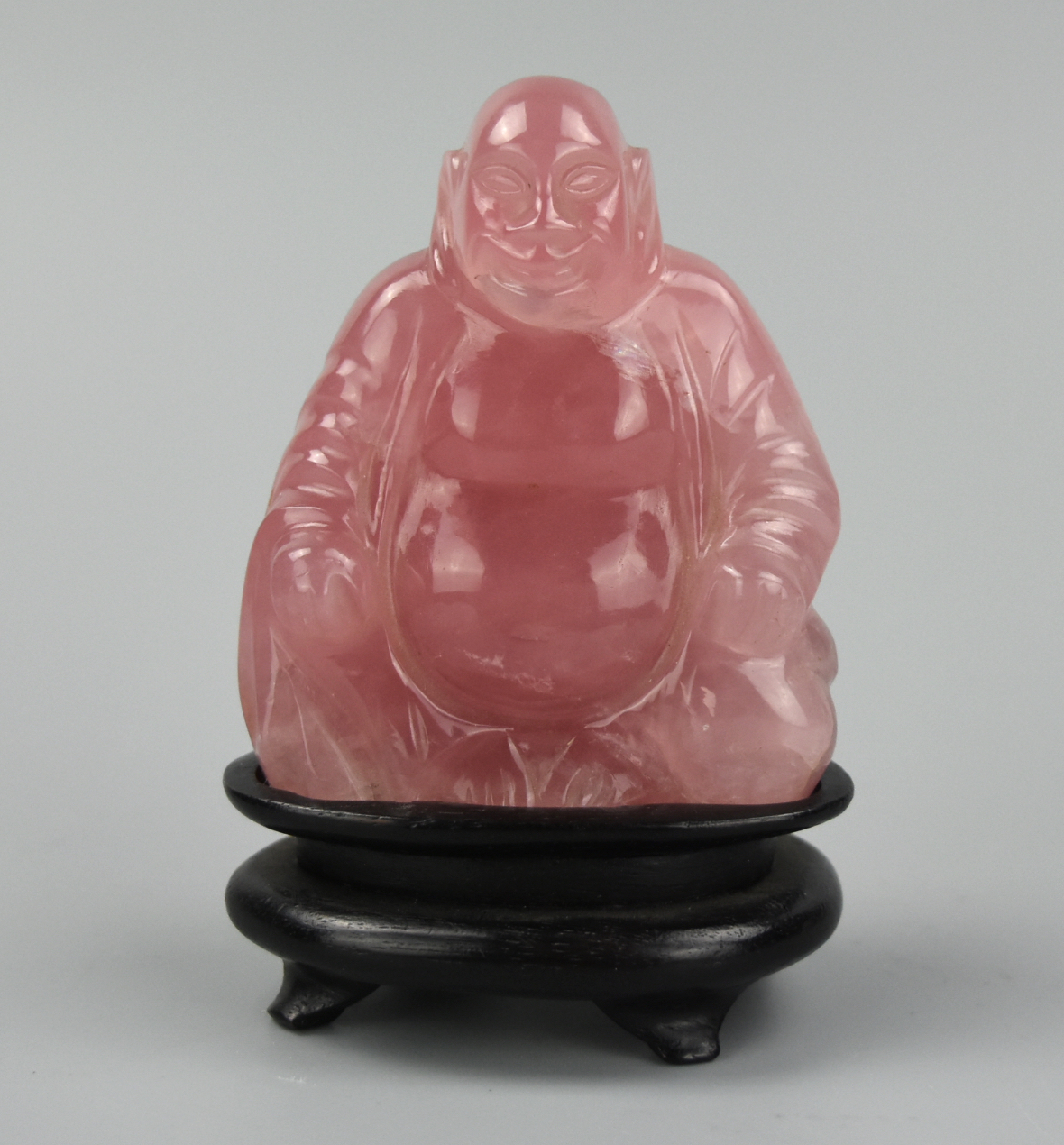 Appraisal: CHINESE PINK QUARTZ BUDDHA FIGURE STAND TH C A Chinese