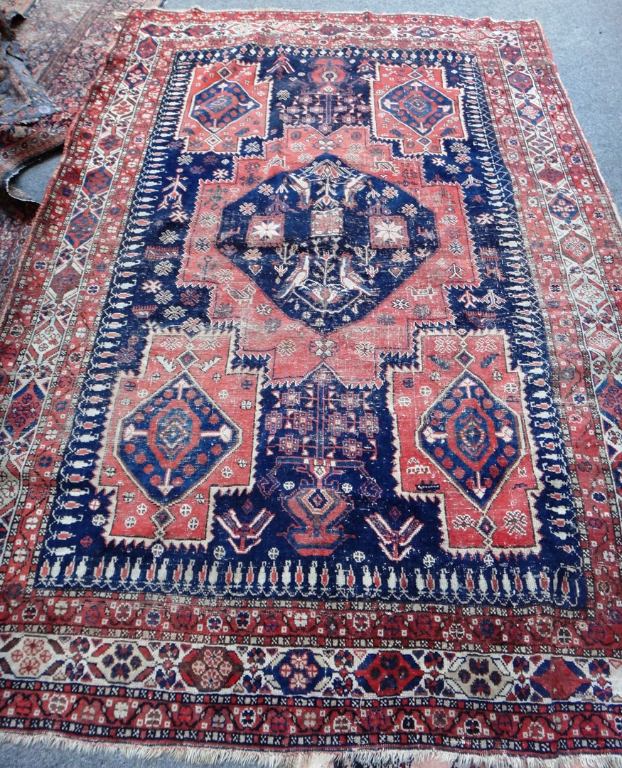 Appraisal: An Afshar rug Persian the dark indigo field with a