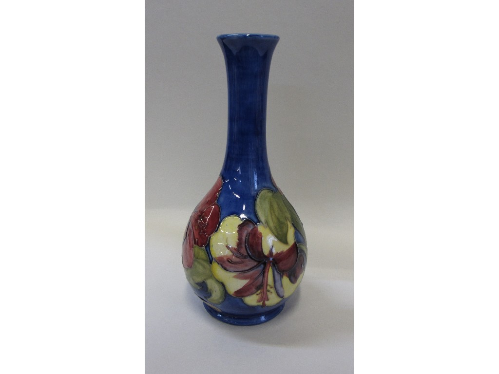 Appraisal: Moorcroft Hibiscus vase on blue ground