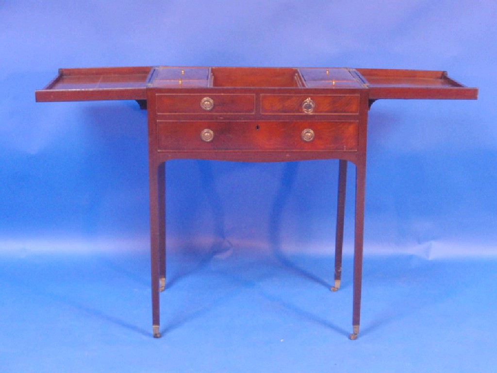 Appraisal: A Georgian mahogany gentleman's dressing table with double hinged lid