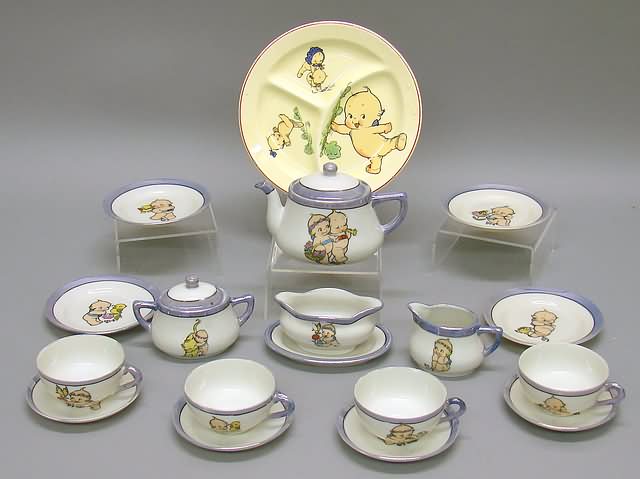 Appraisal: Kewpie china tea set and divided plate Pc tea set