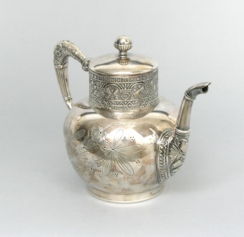 Appraisal: An Aesthetic Movement Teapot A beautiful silver plated bulbous shape