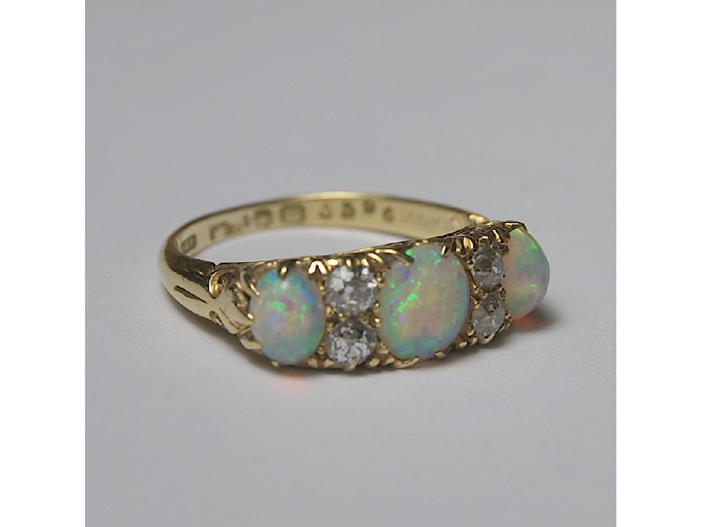 Appraisal: Opal and old cut diamond seven stone half-hoop antique ring