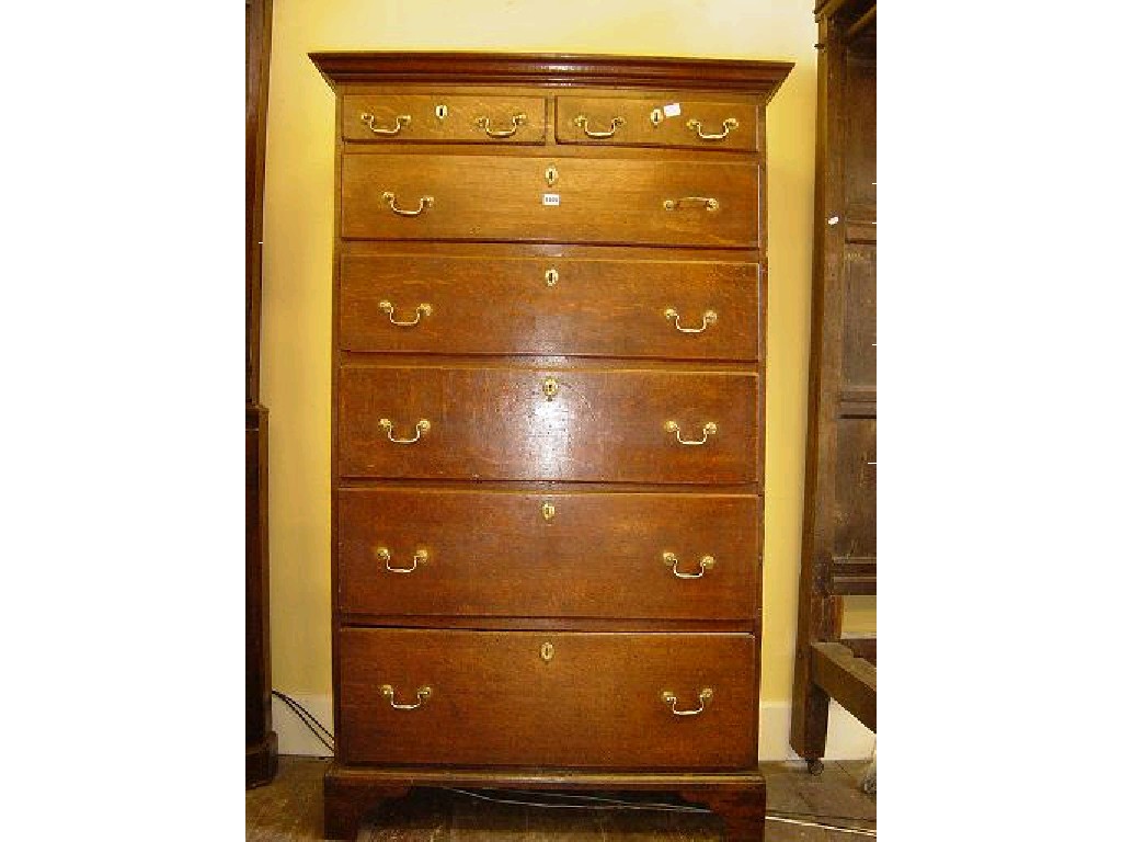 Appraisal: A Georgian oak chest fitted with an arrangement of five