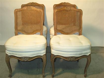 Appraisal: Set of four French fruitwood dining chairs In the country