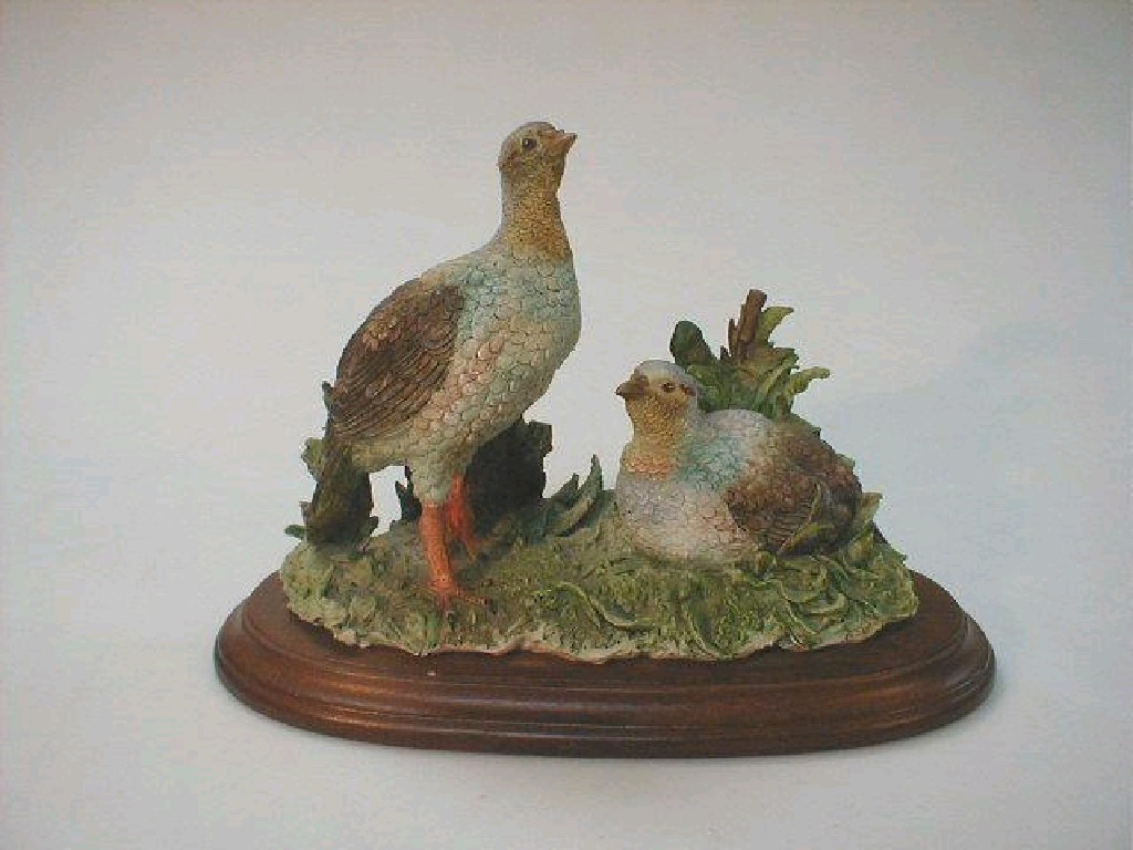 Appraisal: A Capo-de-Monte figure group of game birds high