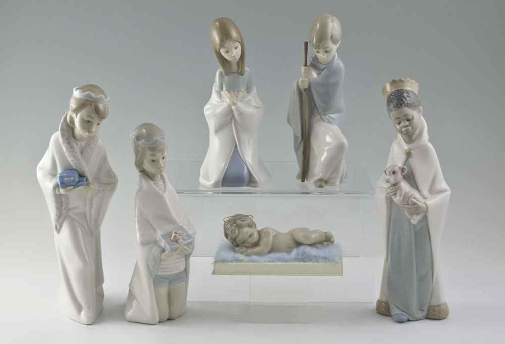 Appraisal: LLADRO PORCELAIN FIGURINES NATIVITY CHILDREN Juan Huerta sculptor issued retired