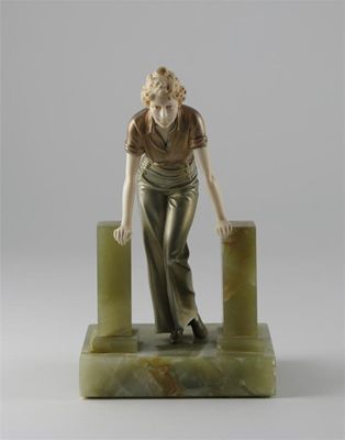 Appraisal: The Stile' a cold painted bronze and ivory figure cast