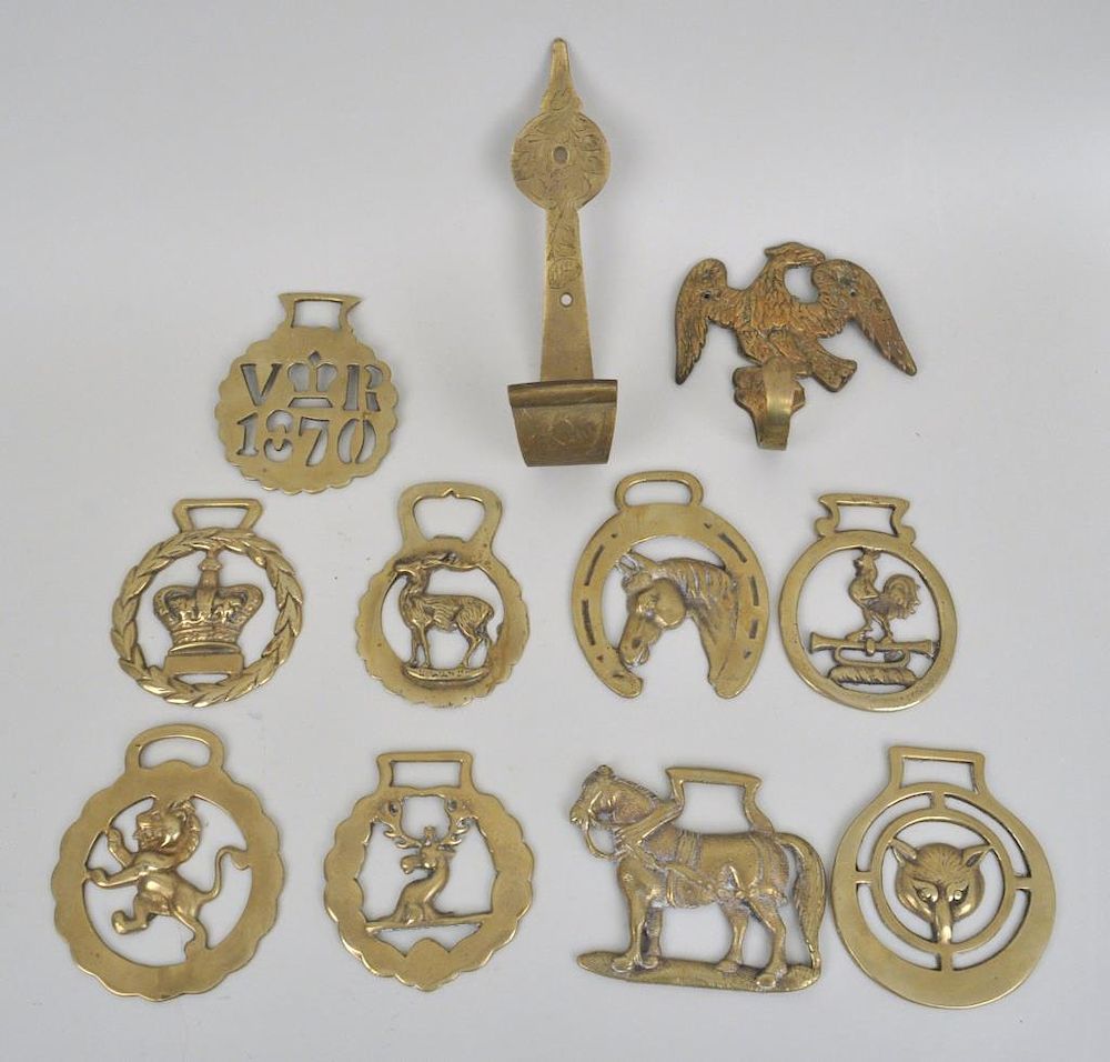 Appraisal: Group Nine Figural Horse Brasses Two Hooks with various designs