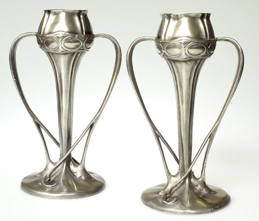 Appraisal: PAIR OF LIBERTY CO TUDRIC PEWTER TULIP VASES the bulbous