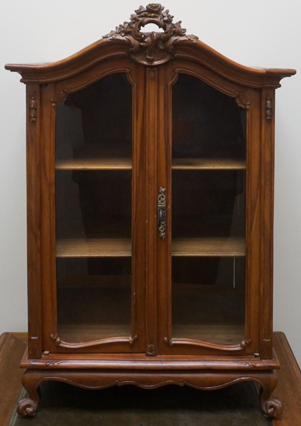 Appraisal: Provincial Style Walnut and Double Glazed Door Diminutive Armoire-Vitrine x