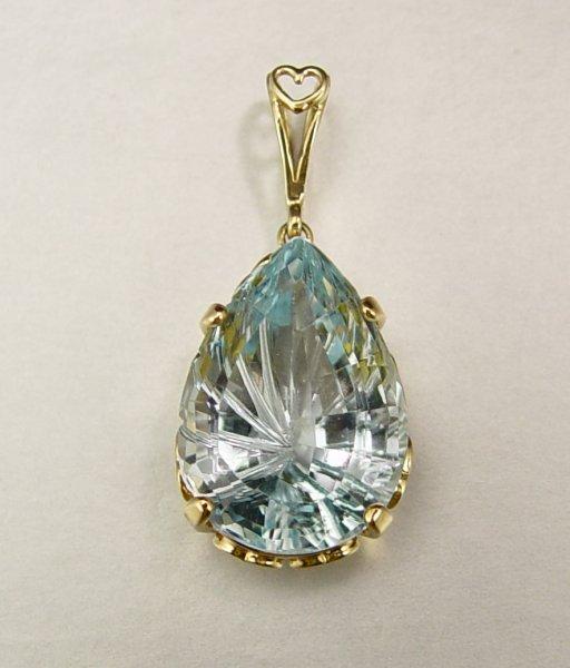 Appraisal: K CT TOPAZ PENDANT K yellow gold pendant contains one