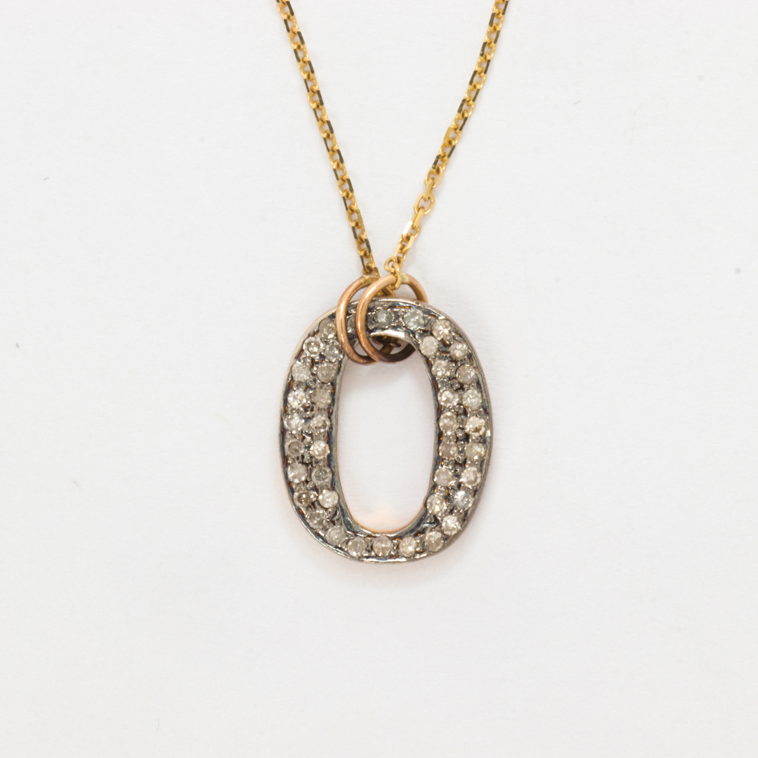 Appraisal: A DIAMOND PENDANT NECKLACE A diamond pendant necklace designed as