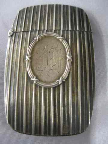 Appraisal: Sterling Silver Match Safe Art Deco linear design medallions ''