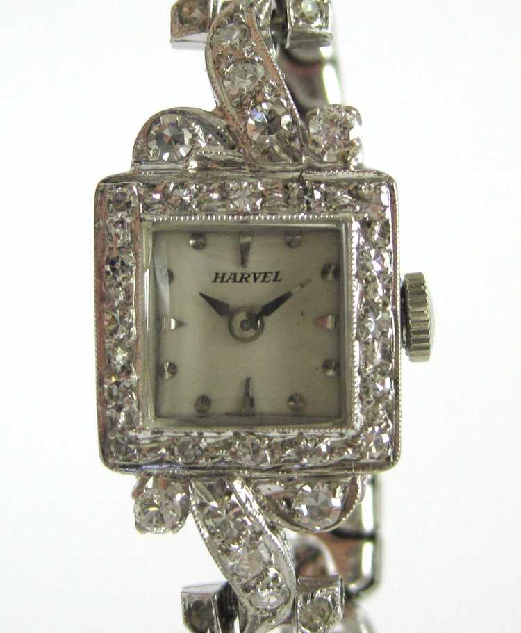 Appraisal: LADY'S DIAMOND AND WHITE GOLD WRIST WATCH WITH APPRAISAL Swiss