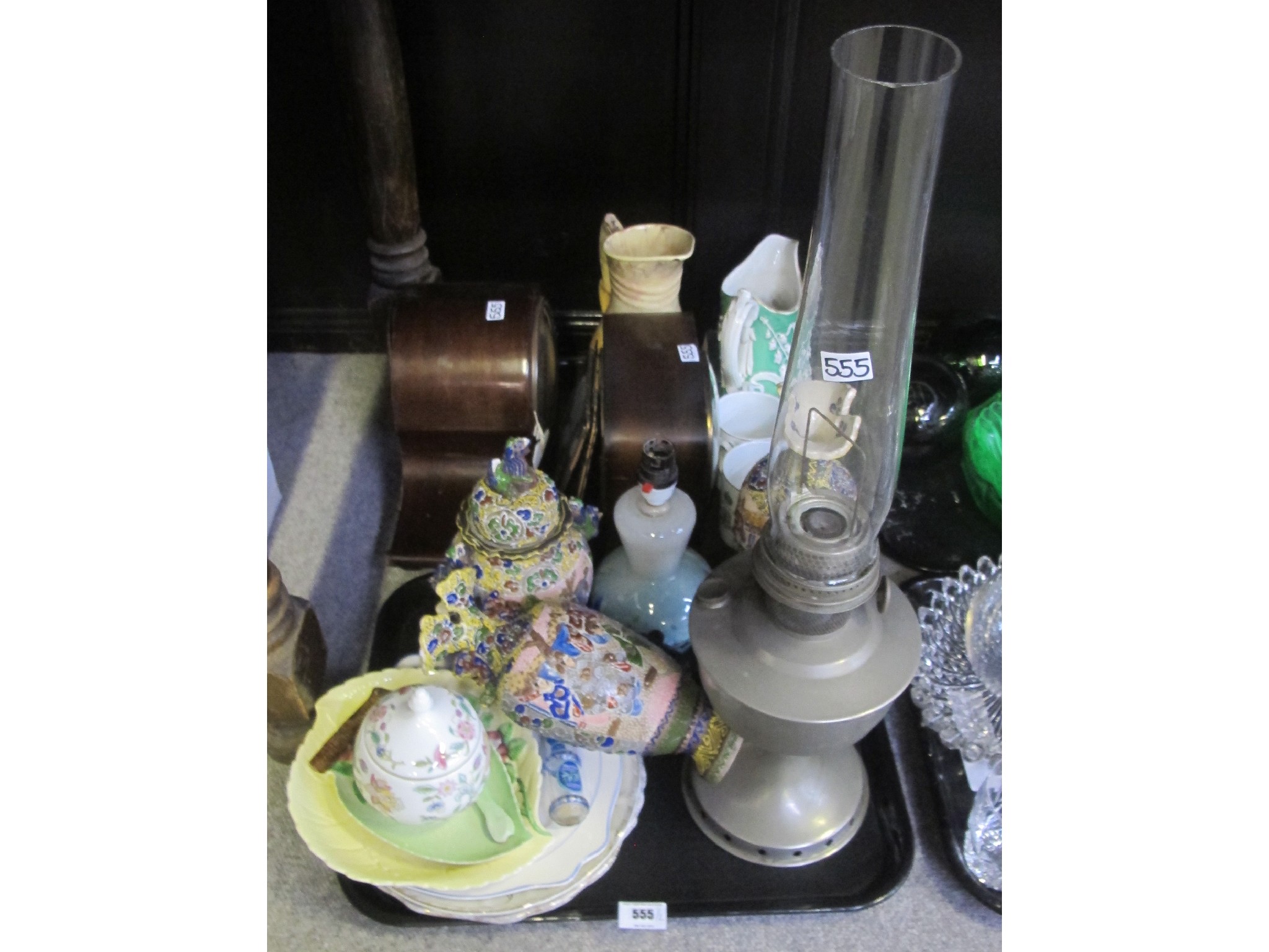 Appraisal: Two mantle clocks urns and vase garniture Scottish glass table