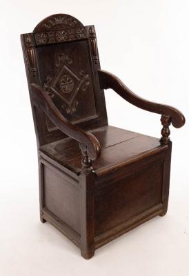 Appraisal: A th Century oak wainscot chair with arch-top panelled back