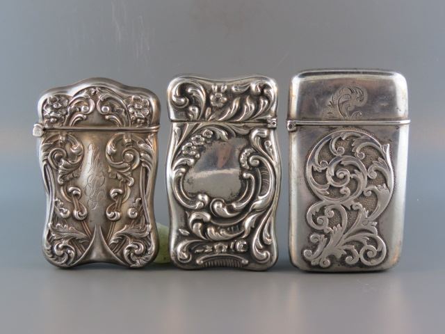 Appraisal: Sterling Silver Match Safes ornate floral and rococo designs X