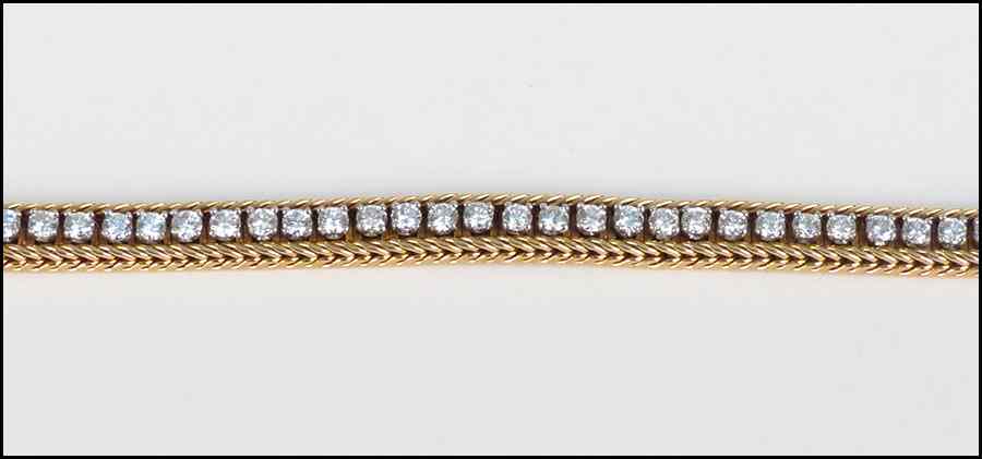 Appraisal: DIAMOND AND KARAT YELLOW GOLD LINE BRACELET Comprised of prong