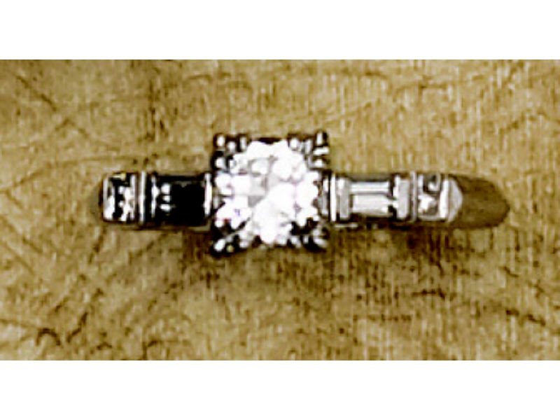 Appraisal: DIAMOND ENGAGEMENT RING Platinum traditional style engagement ring set with