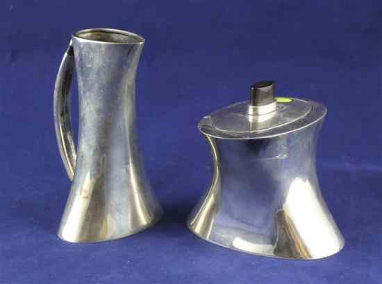 Appraisal: A stylish Indian white metal Ravissant cream jug and sugar