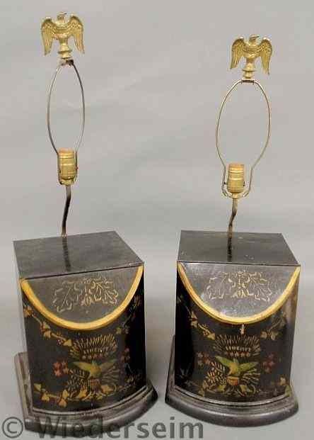 Appraisal: Pair of black tin bin-form lamps with gilt stencil Tole