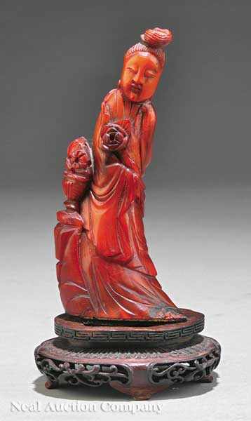 Appraisal: A Chinese Carved Buffalo Horn Figure of Guanyin the gently