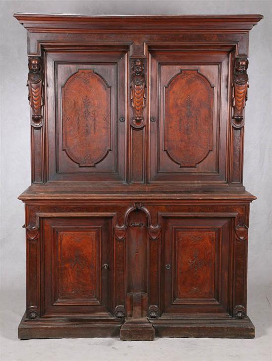 Appraisal: TWO PIECE CUPBOARD Large ornate walnut cupboard with paneled sides