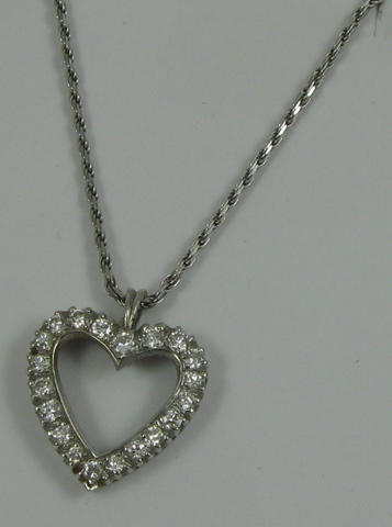 Appraisal: DIAMOND AND FOURTEEN KARAT GOLD PENDANT NECKLACE The white gold