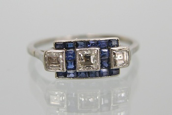 Appraisal: An Art Deco Style Platinum Diamond and Sapphire Ring A