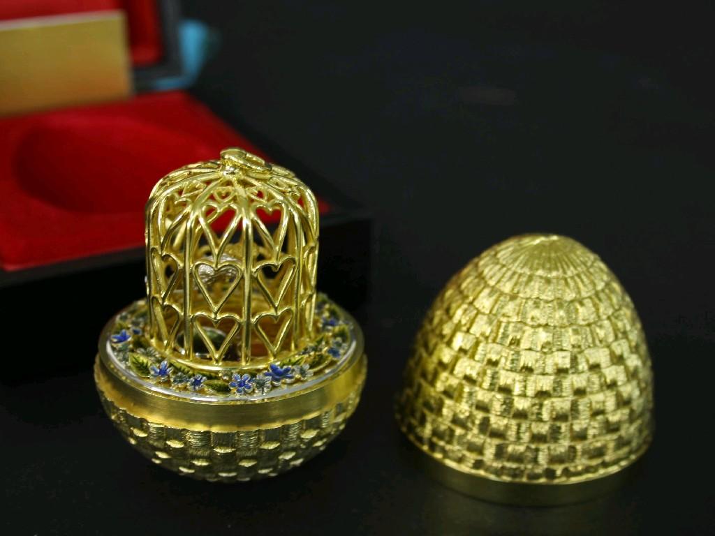 Appraisal: Stuart Devlin silver-gilt Easter egg limited edition the stylised egg